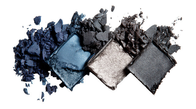 Top view of dark blue, silver glitter and black cosmetic eyeshadow palette isolated on pure white background.