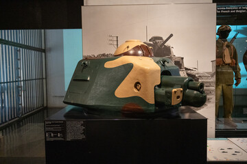 Paris, France - 8 Nov 24: Armored vehicle turret exhibit in museum, Paris © Joseph Creamer