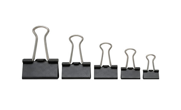 Essential office binder clips, a set of five black metal paper fasteners, various sizes for document organization, professional stationery supplies isolated on Transparent Background