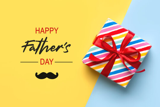 Happy Father's Day. Top view of colorful gift pack and the text Happy Father's day