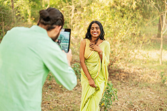 Cute Indian woman photographed by her boyfriend