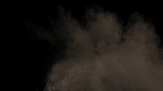 Realistic fiery explosion with a large cloud of billowing smoke and debris on a black background.