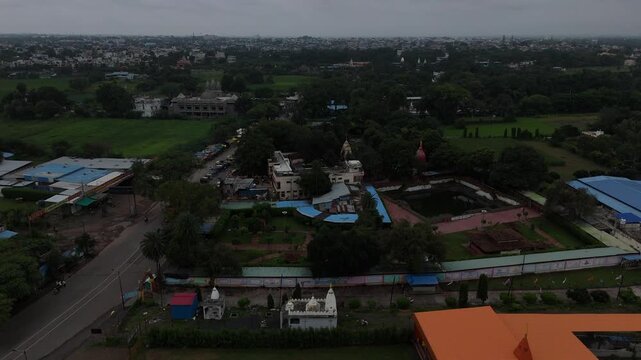 Aerial view of the historic Maharishi Sandipani Ashram and sacred pond in Ujjain, Madhya Pradesh.