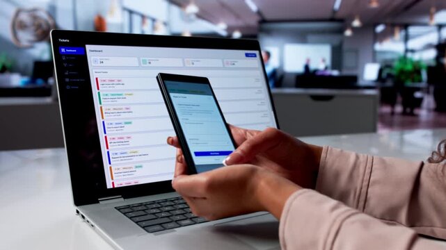 Customer Support Agent Resolves IT Service Tickets Using Laptop