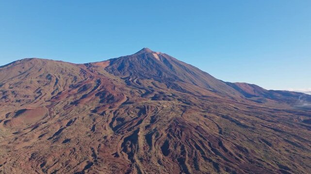 Cinematic drone footage of Teide National Park featuring volcanic landscapes, lava fields, rugged mountain scenery, and breathtaking aerial views of Tenerife.
