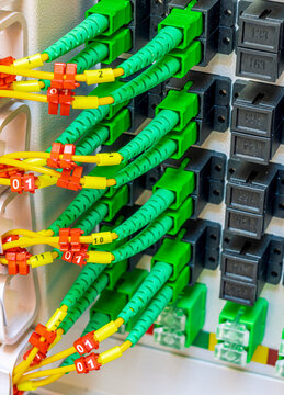 optical ports and cables in telecommunication rack of a server station