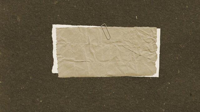 Crumpled vintage paper note pinned with a metal clip in this creative motion animation design for professional text display