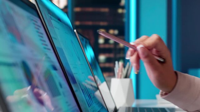 Financial Analyst Reviewing Dashboard Metrics On Laptop
