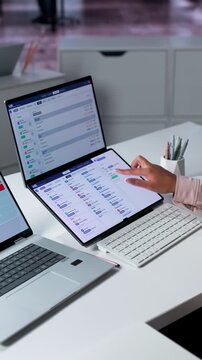 Human Resources Manager Reviewing Applicant Tracking System