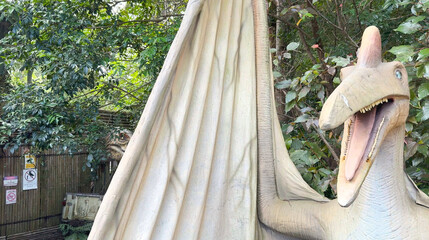 Life Size Pterosaur Dinosaur Model with Open Mouth in Jungle Setting © blueringmedia