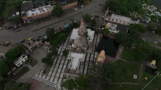 Aerial view of the sacred Bhalka Tirth Temple complex and sacred pond in Veraval, Gujarat.