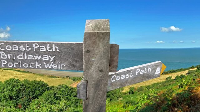Signpost for the South West coast path at Porlock weir , Somerset, Uk