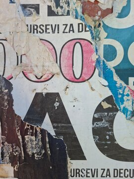 Torn and ripped street poster, grungy background, messy old paper collage