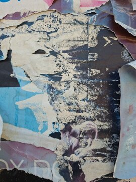 Torn and ripped street poster, grungy background, messy old paper collage