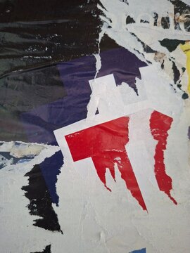 Torn and ripped street poster, grungy background, messy old paper collage