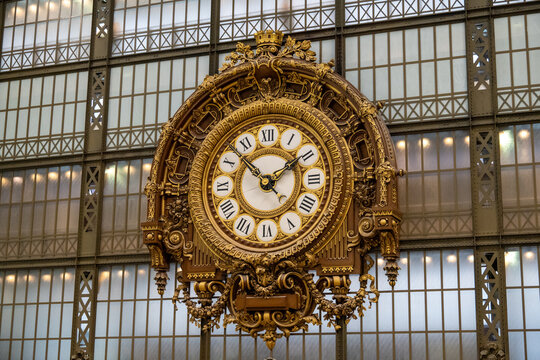 Paris, France - 8 Nov 24: Ornate gilded clock with Roman numerals, Mus&eacute;e d'Orsay