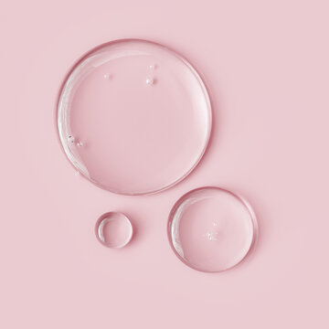 Serum oil sample round shape drops on pink background, 3d rendering gel with hyaluronic acids
