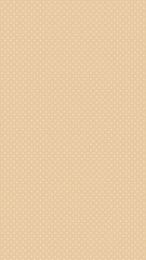 Fototapeta premium Polka dot pattern in soft peach color on textured background 