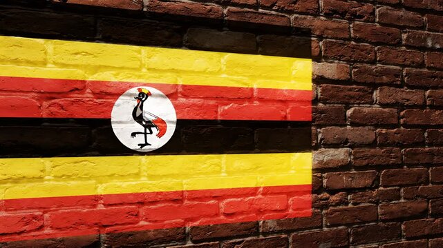Uganda Flag Painted on Brick Wall Texture Background.