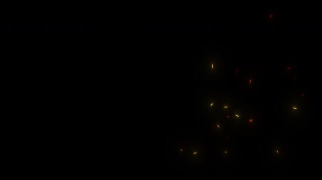 Glowing Hot Embers and Sparks Rising from a Fire at Night on a Black Background.