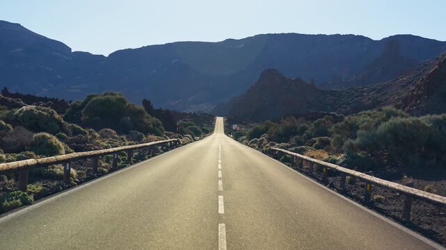 Cinematic drone footage of Teide National Park featuring volcanic landscapes, lava fields, rugged mountain scenery, and breathtaking aerial views of Tenerife.