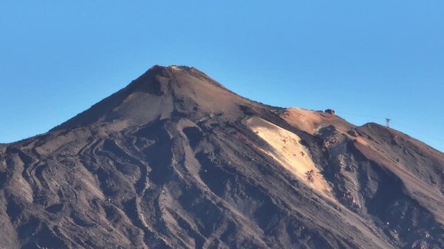 Cinematic drone footage of Teide National Park featuring volcanic landscapes, lava fields, rugged mountain scenery, and breathtaking aerial views of Tenerife.