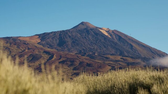Cinematic drone footage of Teide National Park featuring volcanic landscapes, lava fields, rugged mountain scenery, and breathtaking aerial views of Tenerife.