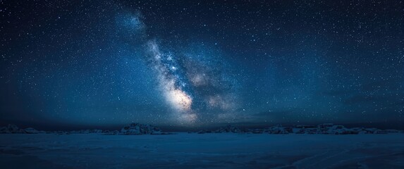Obraz premium Frozen arctic night glowing with stars and Milky Way copy space