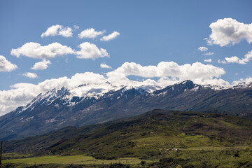 Fototapeta premium Snowy Mountains and Clouds