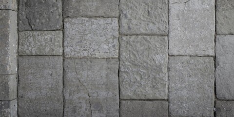 Fototapeta premium Flat lay of a driveway surface with prominent rough texture suitable for copy space background