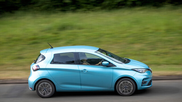 Milton Keynes,Bucks,UK - May 28th: 2020 blue Renault Zoes electric car driving on a British road