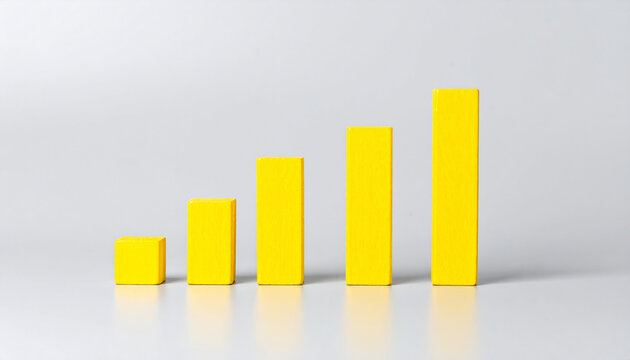 Minimal wooden yellow bar chart, data visualization bars, business analytics and KPI improvement concept, financial growth and performance tracking theme. Close-up.