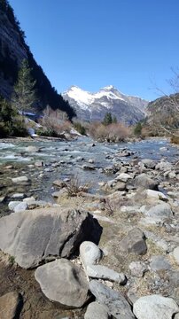 The Bujaruelo Valley, through which the Ara River flows, along with the mountains, the melting snow of the Aragonese Pyrenees, Ordesa y Monte Perdido National Park, the Pyrenees, Huesca
