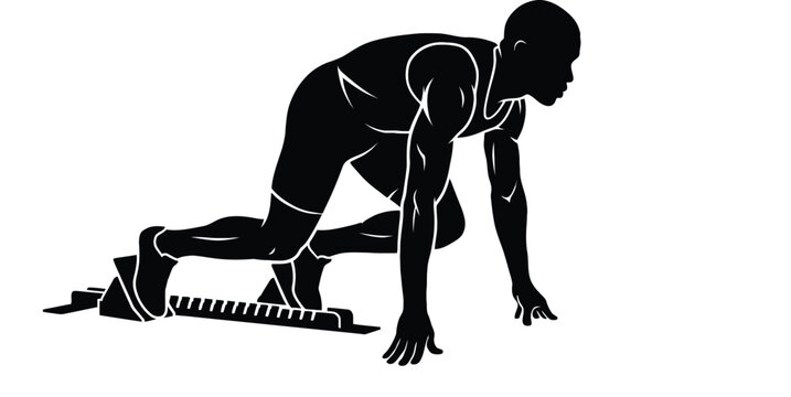 Athlete in starting blocks ready to sprint