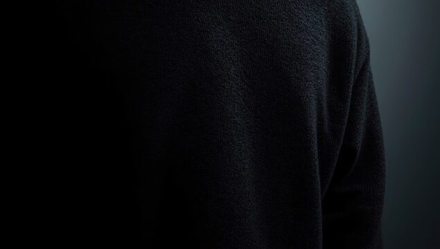 Clothing photograph showing a black fleece sweater and free design area
