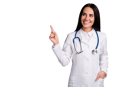 Portrait of her she nice attractive lovely charming cheerful friendly brunet girl showing copy space professional medical help aid visit doc isolated on grey pastel color background