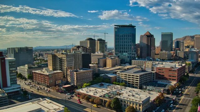 Aerial view of downtown Salt Lake City featuring historic City and County Building and modern skyscrapers.
