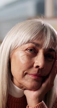 Thinking, senior woman and happy at house with vision, calm expression and nostalgia memory. Thoughts, elderly person and reminiscing with sentimental reflection, daydreaming and remember past life