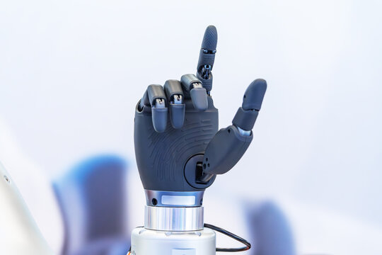 Artificial robotic hand at the presentation of robotics.Creation of artificial intelligence