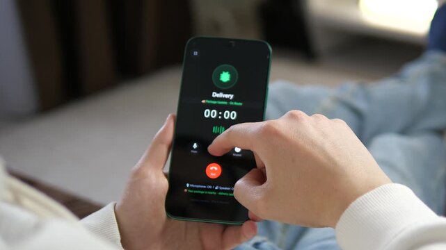 Modern consumer answering a call from a delivery service on a smartphone. High-quality footage showcasing the convenience of online shopping and courier communication. Perfect for e-commerce, retail