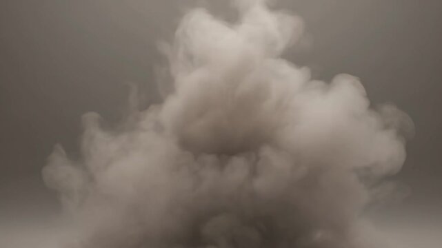 A clear water drop hits the calm liquid surface followed by thick rolling smoke and fire