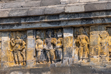 Fototapeta premium Borobudur, Magelang, Central Java, Indonesia, Relief appearance at Borobudur Temple depicting Buddhist ritual ceremonies