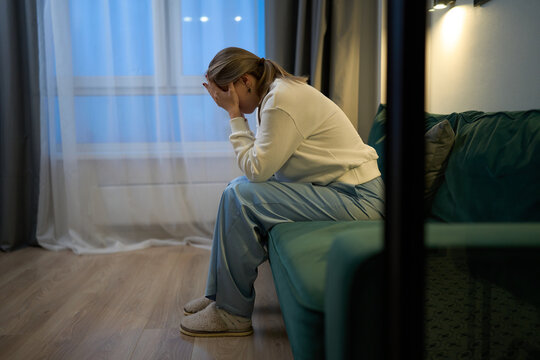 Overwhelmed woman processing difficult emotions