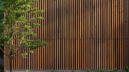 Obraz premium Wooden facade with vertical slats framed by greenery in Scandinavian style