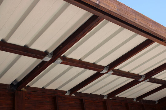 Charpente bois pour carport, abri de jardin et patio couvert monopente en bac acier, le bac acier solution de couverture pour abris en kit