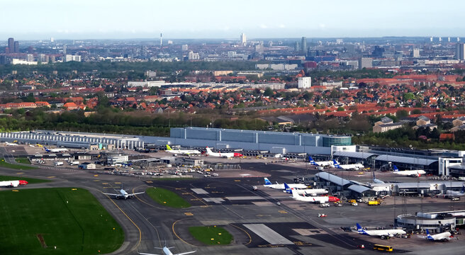 Aerial or drone view of Copenhagen capital city of Denmark with the airport CPH