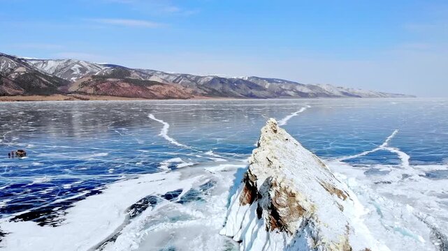 Scenic Icy Landscape With Mountains. Peaceful Icy Promontory With Expansive Mountain And Sea Scene