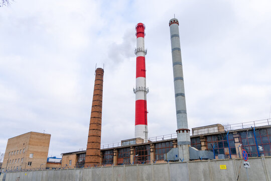 Industrial skyline scene. An industrial horizon with distinct chimney types and structural layers