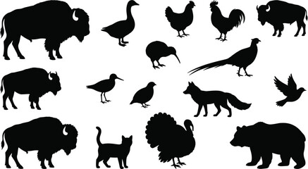 Large collection of black animal silhouettes including bison bear fox cat turkey rooster and various wild birds isolated on a white background © MdMonowar