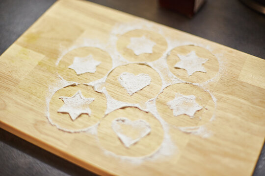 Classic Linzer Christmas Cookies with raspberry or strawberry jam.